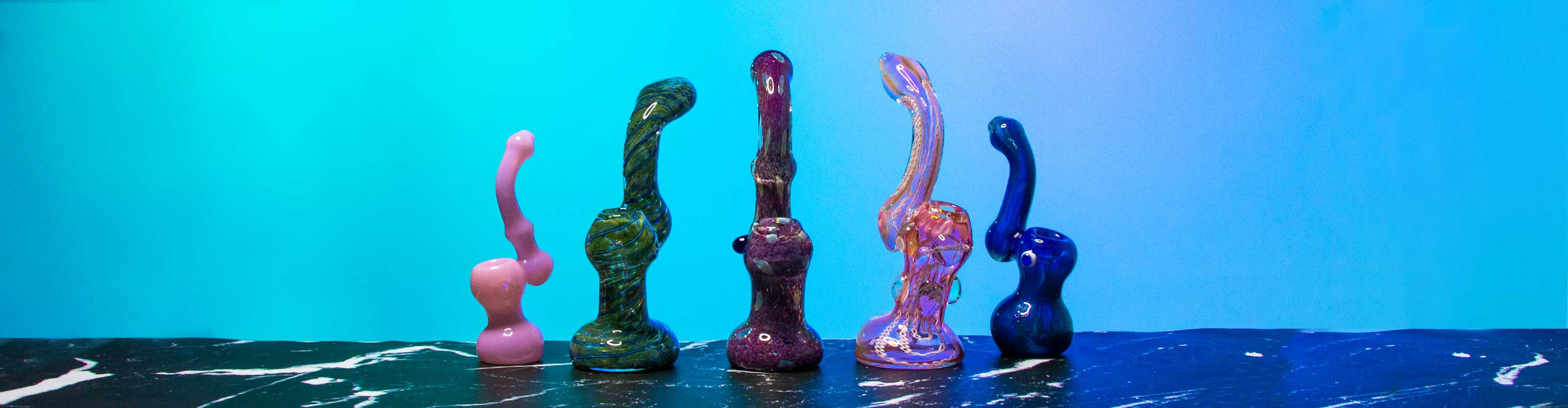 Various designs of Bubblers inside studio with colorful lighting